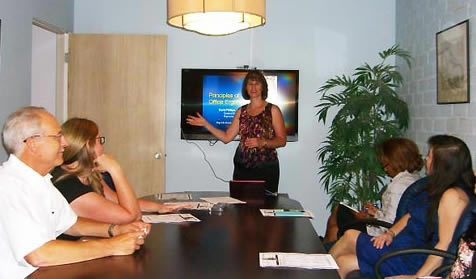 Barb pictured here providing an Ergonomic Training. 